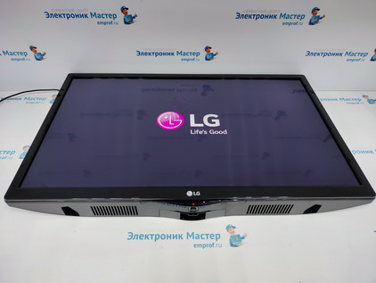 Телевизор LG 24LK451V-PZ висит на заставке